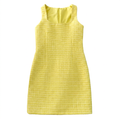 Yellow tweed dress centered on a white square background